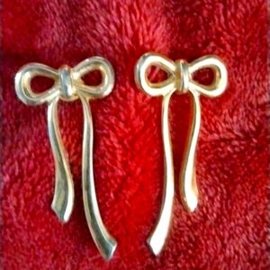 Gold color bowtie pierced earrings in very good condition